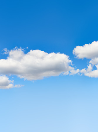 Blue sky with cloudsの写真素材