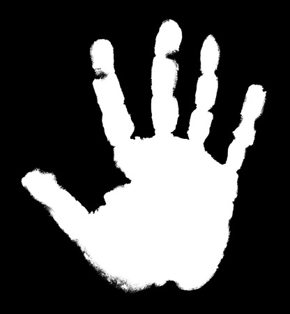 White handprint on a black backgroundの写真素材