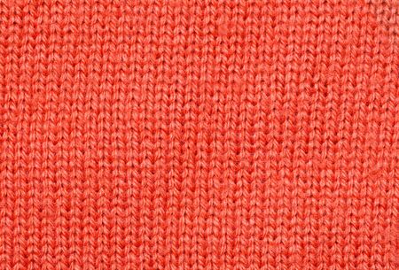Red knitted fabric texture. Abstract background.の写真素材