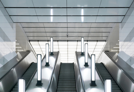 Escalator in modern urban interiorの写真素材