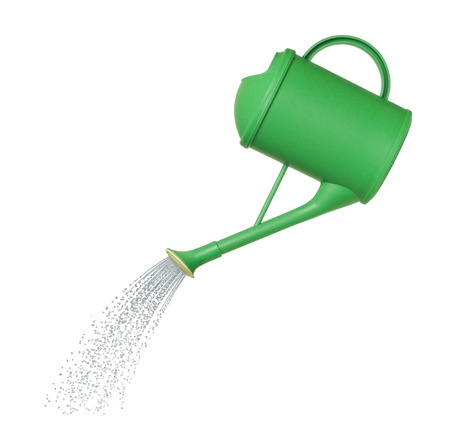 water pours from a watering can on white backgroundの写真素材
