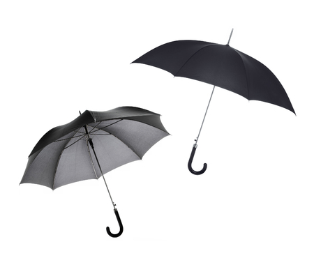 Black umbrellas on a white backgroundの写真素材