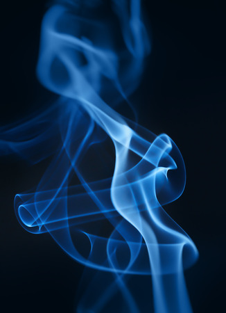 Smoke closeup on a black background. Macro photo.の写真素材