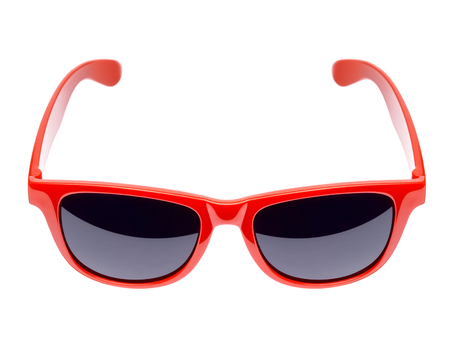 Red sunglasses on a white backgroundの写真素材
