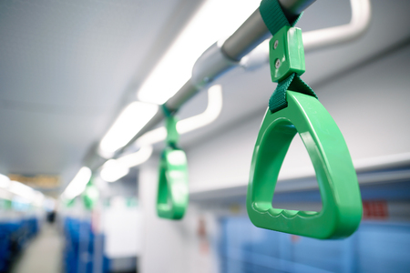 Handhold close-up inside the passenger wagon.                           の写真素材