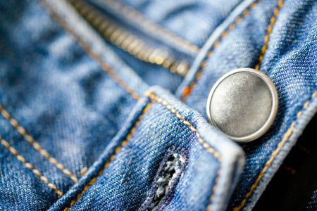 Button on jeans close-up                     