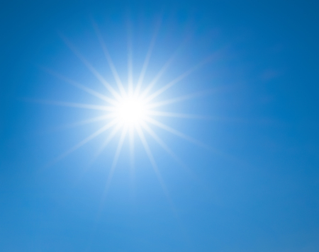 sun is in a star shape on blue skyの写真素材