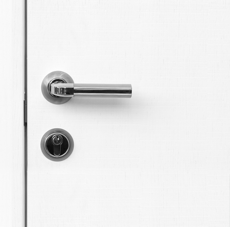 fragment white door with handle and keyholeの写真素材