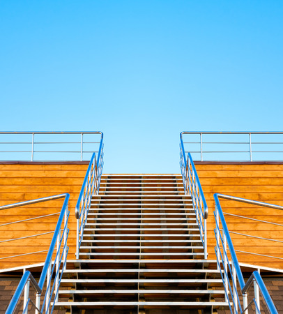 Stairs to the tribune or podium on a background of blue sky.の写真素材