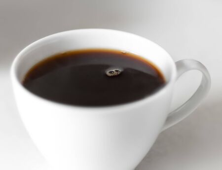 Cup of coffee or strong tea close up の写真素材