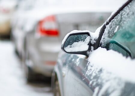 car rearview mirror in the snow close-upの写真素材