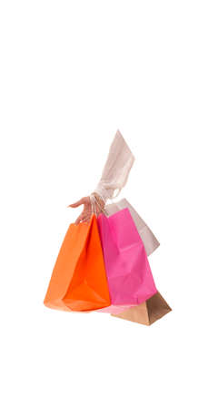Hand holds a bunch of packages with new purchases.の写真素材
