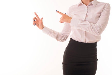 Girl shows with hands on empty space.の写真素材