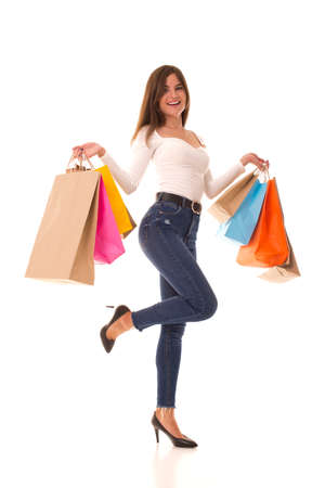 Girl in heels posing with new purchases.の写真素材