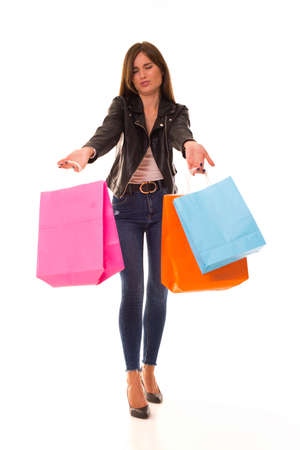 A Young woman very unhappy with shoppingの写真素材