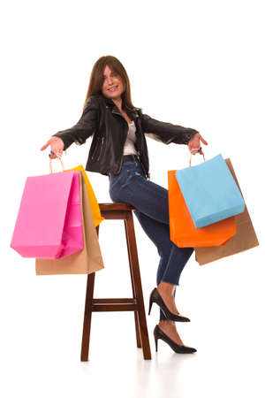 Girl spreads arms after an unsuccessful shopping.の写真素材