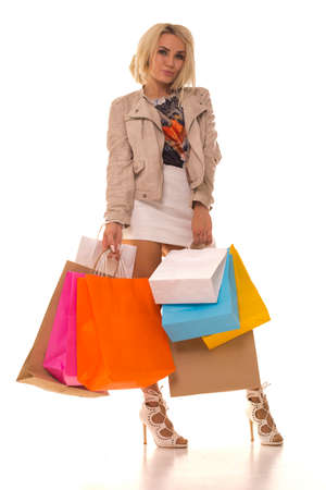 Girl posing with new purchases after sale.の写真素材