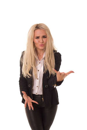 Blonde in a black jacket shows emotions.の写真素材