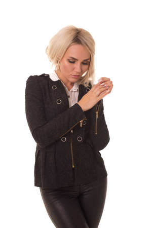 Woman clasped her hands together and is sad.の写真素材