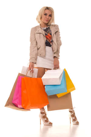 Girl posing with new purchases after sale.の写真素材
