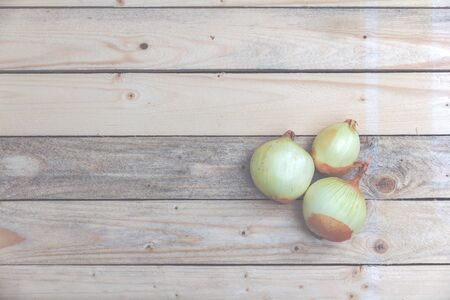 onion on a wooden box. toningの写真素材