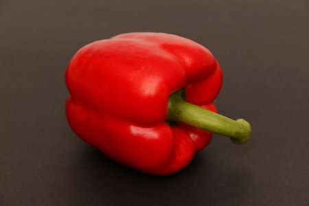 red bell pepper on a dark background