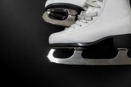 white  leather classic skates for women figure skating on iceの写真素材