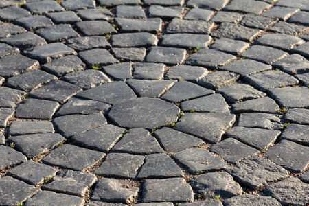 Old Paving stone, granite pavement - Shallow depth of field. abstract masonry backgroundの写真素材