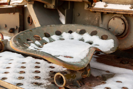 Empty iron seat for anti-aircraft gunner. Old Soviet military equipmentの写真素材