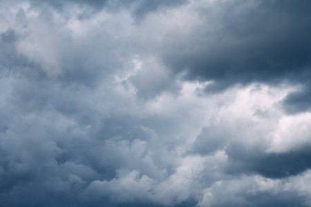 Cold gloomy sky. Under the rainy clouds