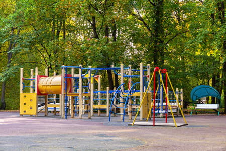 Modern children's sports entertainment complex in an empty autumn park without people. The territory of outdoor gamesの写真素材