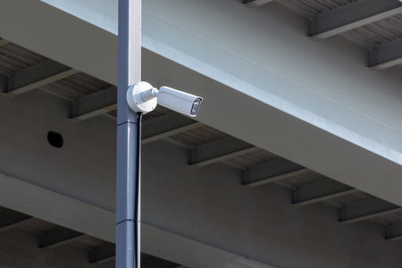 CCTV camera under the bridge. Automated traffic control system and face recognition