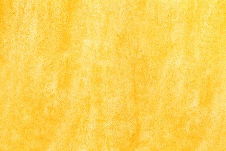 Bright yellow texture of the old wall surface for the backgroundの写真素材