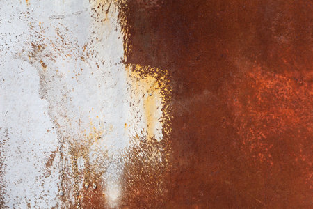 Rusty metal surface with white paint. Natural color industrial backgroundの写真素材