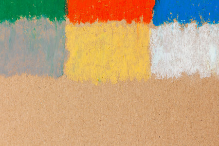 Painting with colored pastel crayons on cardboard in the form of rectangles. Colorful background with oil pastel stains on craft paperの写真素材