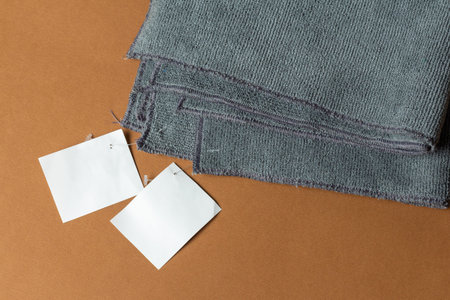 New gray microfiber cloths with paper tags. cleaning tool