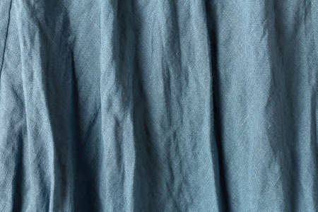 Texture of blue cotton material of women's large size dress. Creases and shadowsの写真素材
