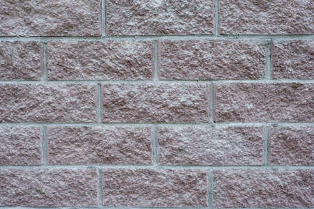 Stone tiled wall texture masonry background. brick claddingの写真素材