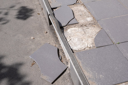 broken modern tiles on the steps of the street porchの写真素材
