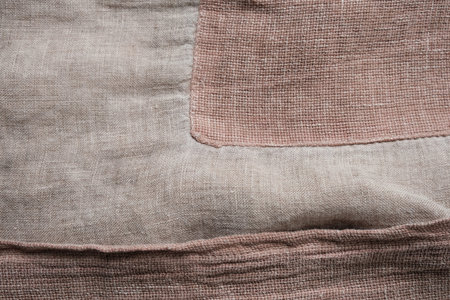Linen fabric with large rectangular patch and seams
