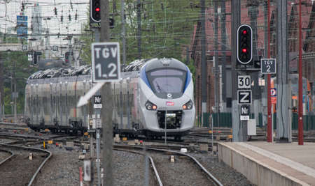 French National Railways (SNCF) TER (Interregnit Express) entering Strasbourg Stationのeditorial素材