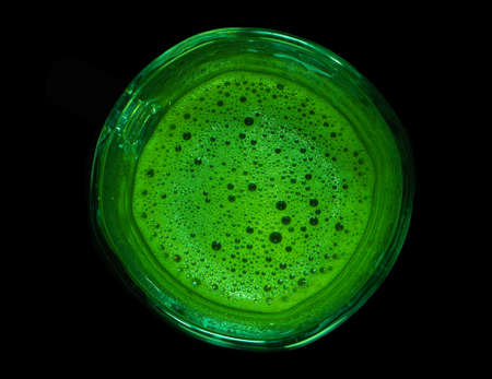 japanese matcha tea in a mug on a black backgroundの写真素材