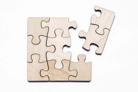 Connect empty wooden puzzles on a white background. Top view. 3D illustration.