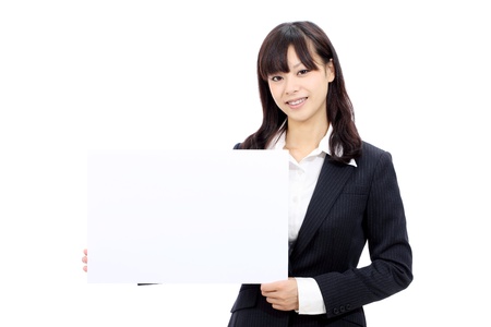 Young asian business woman holding blank boardの写真素材
