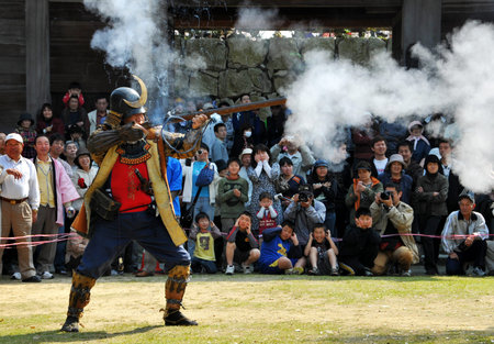 Ehime, Japan - April 6: The festival reproducing how to fight ancient times at Kawanoe castle. April...