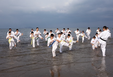 Ehime, Japan - January 3: Japanese martial art houses training of karate at the new year at the Ichinomiya beach. January 3, 2012 in Ehime, Japan.のeditorial素材