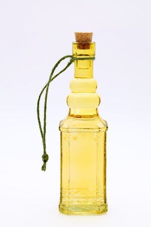 Bottle of oil isolated on white background の写真素材