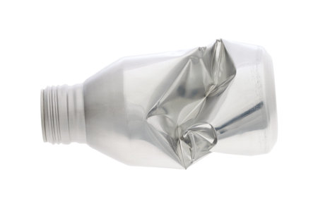 crumpled aluminium bottle isolated on white