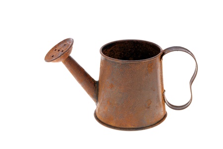 rusted old miniature watering can isolated on white background の写真素材