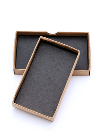 opened old cardboard box on white background